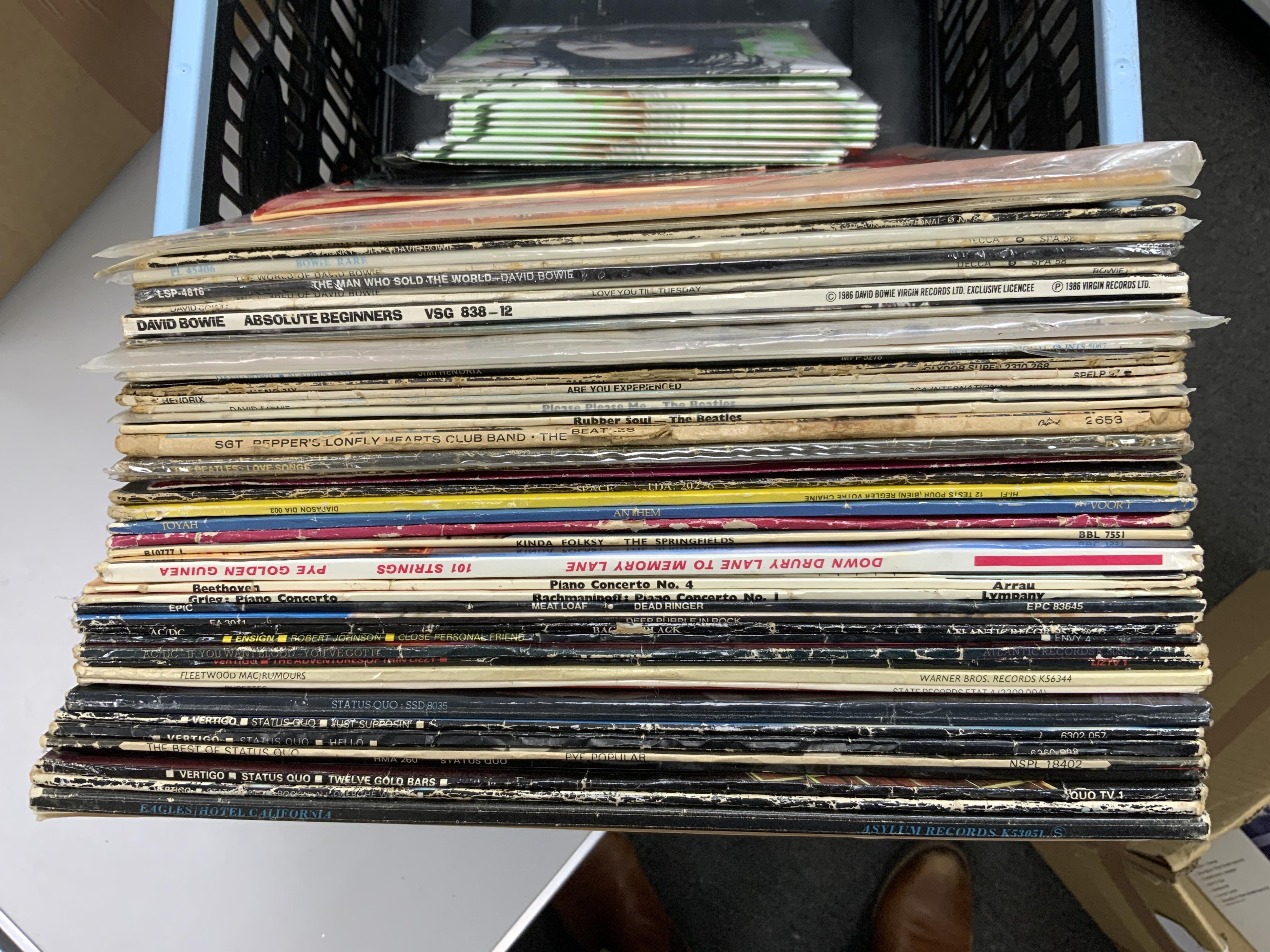 Ninety LP record albums, 12” and 7” singles, etc. artists including; David Bowie, Jimi Hendrix, the Beatles, AC/DC, Fleetwood Mac, Status Quo, etc. together with a number of duplicate issues of modern drum and bass etc i